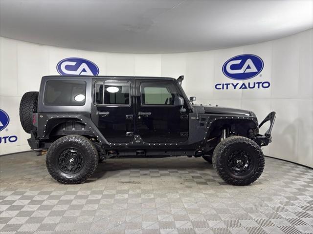 used 2014 Jeep Wrangler Unlimited car, priced at $17,500