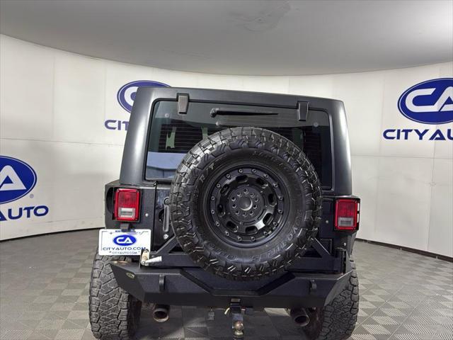 used 2014 Jeep Wrangler Unlimited car, priced at $17,500