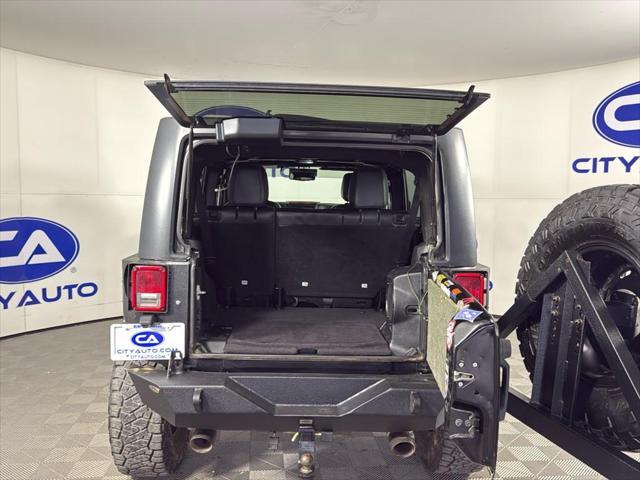 used 2014 Jeep Wrangler Unlimited car, priced at $17,500