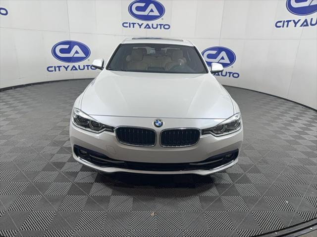 used 2018 BMW 330 car, priced at $15,500