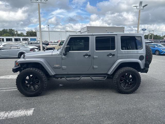 used 2015 Jeep Wrangler Unlimited car, priced at $16,533