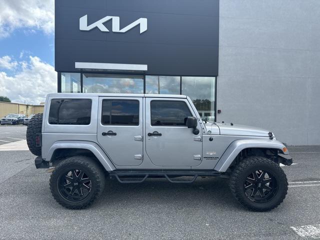 used 2015 Jeep Wrangler Unlimited car, priced at $16,533