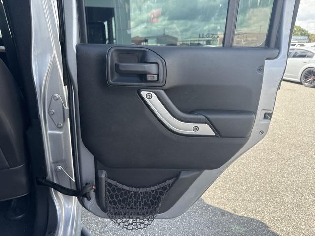used 2015 Jeep Wrangler Unlimited car, priced at $16,533
