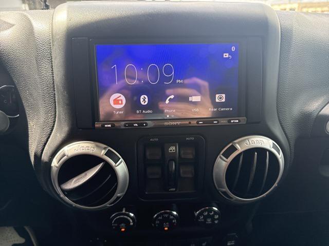 used 2015 Jeep Wrangler Unlimited car, priced at $16,533