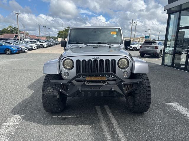used 2015 Jeep Wrangler Unlimited car, priced at $16,533