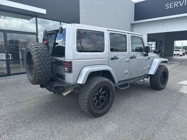 used 2015 Jeep Wrangler Unlimited car, priced at $16,533