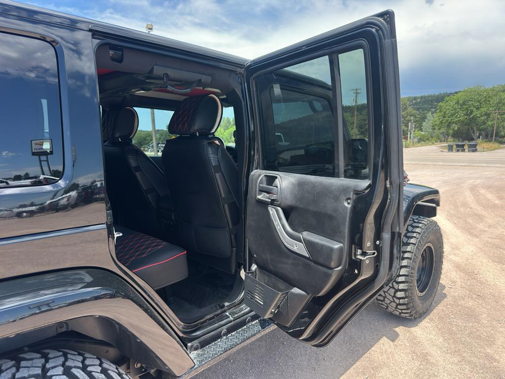 used 2013 Jeep Wrangler Unlimited car, priced at $23,970