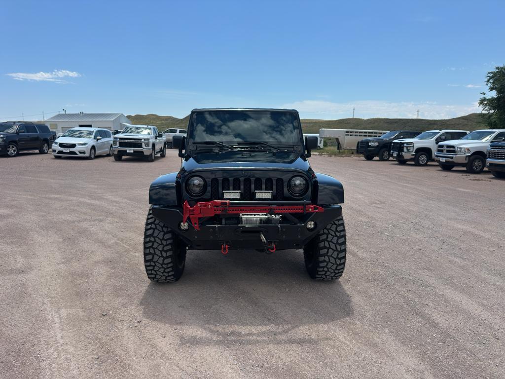 used 2013 Jeep Wrangler Unlimited car, priced at $23,970