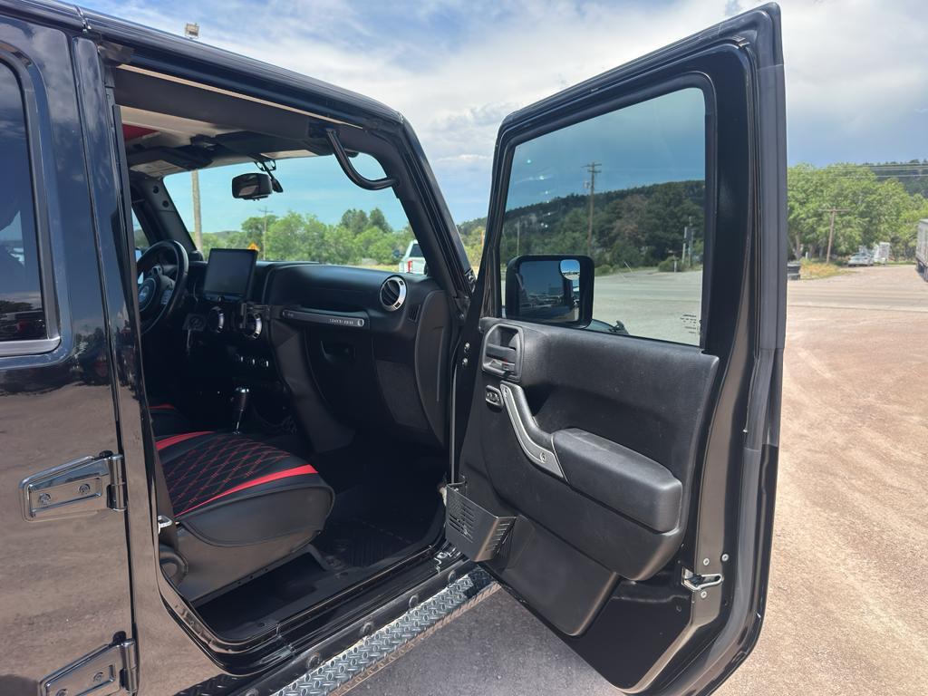 used 2013 Jeep Wrangler Unlimited car, priced at $23,970