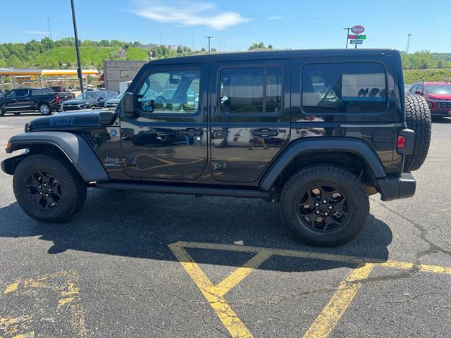 used 2023 Jeep Wrangler 4xe car, priced at $30,979