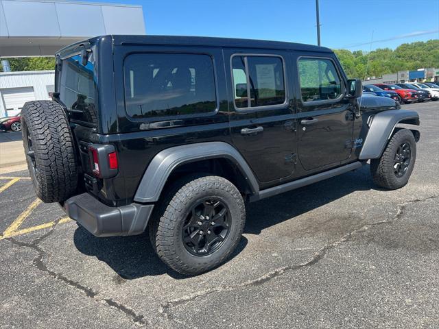 used 2023 Jeep Wrangler 4xe car, priced at $30,979