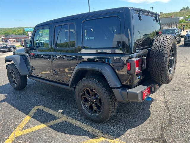used 2023 Jeep Wrangler 4xe car, priced at $30,979