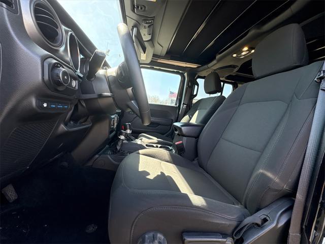 used 2023 Jeep Wrangler 4xe car, priced at $30,980