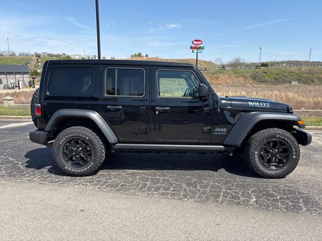 used 2023 Jeep Wrangler 4xe car, priced at $30,980
