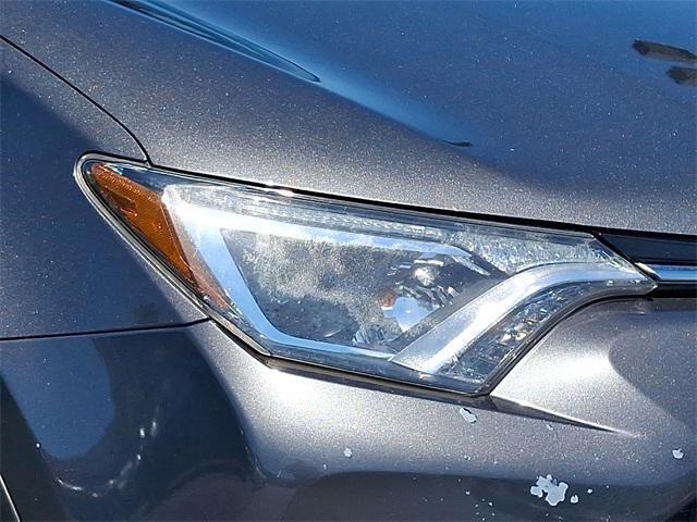 used 2018 Toyota RAV4 car, priced at $18,000