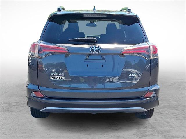 used 2018 Toyota RAV4 car, priced at $18,000