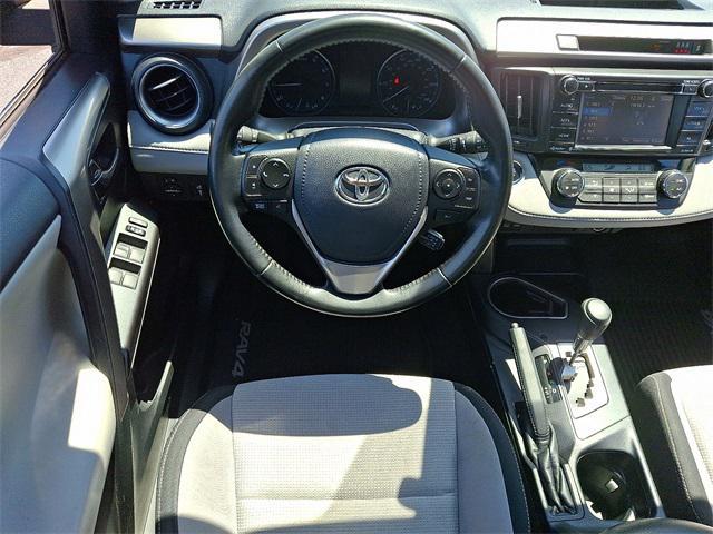 used 2018 Toyota RAV4 car, priced at $18,000