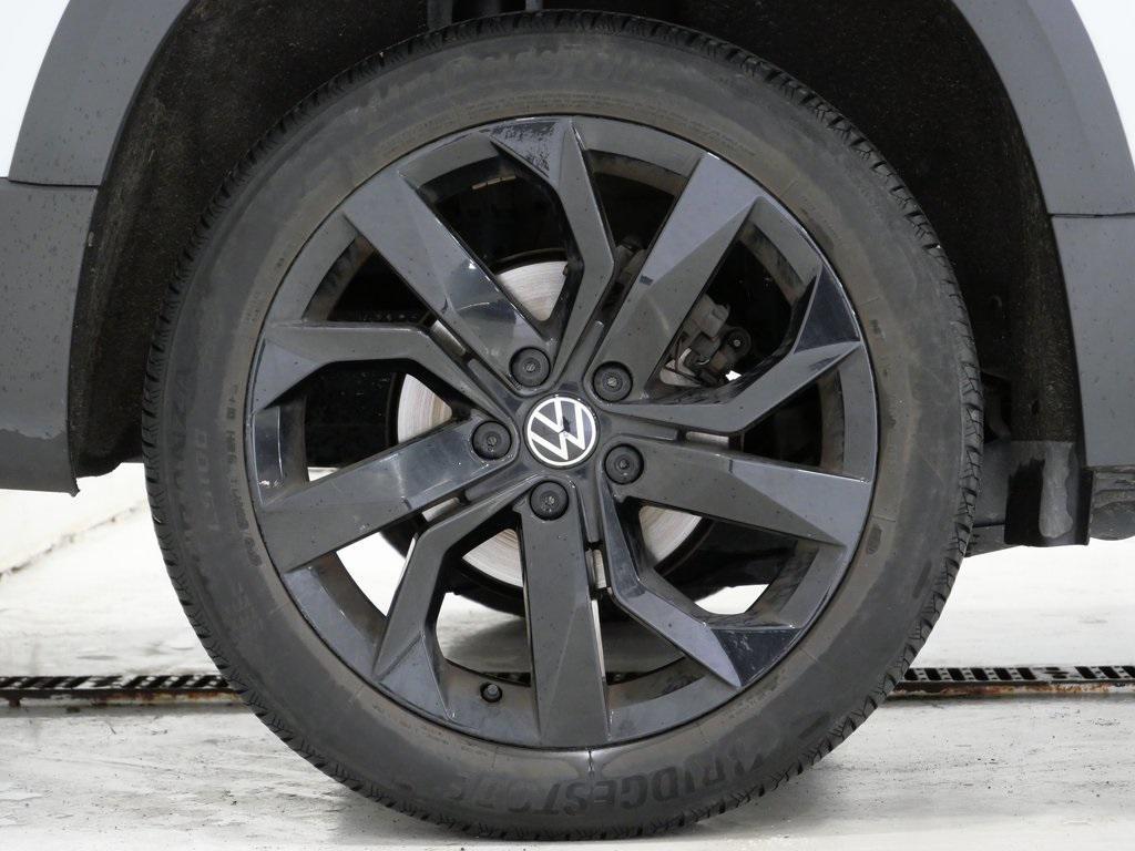 used 2022 Volkswagen Taos car, priced at $18,000