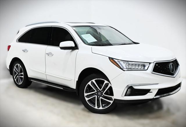 used 2018 Acura MDX car, priced at $27,000