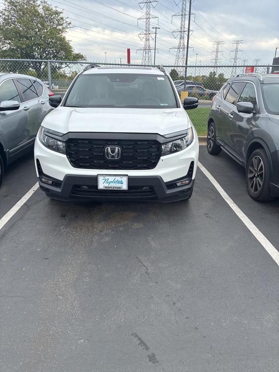 used 2023 Honda Passport car, priced at $35,800