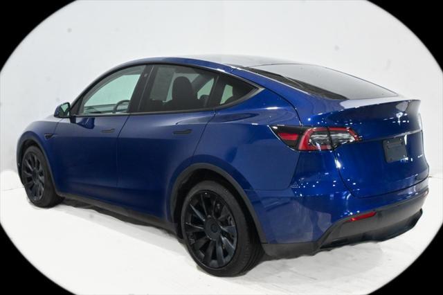 used 2022 Tesla Model Y car, priced at $28,000