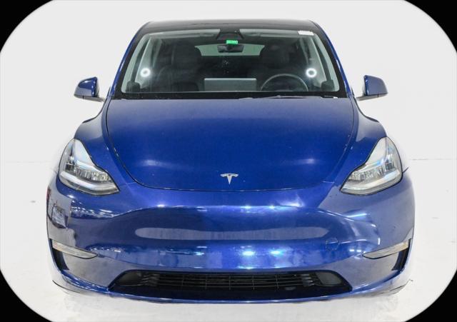 used 2022 Tesla Model Y car, priced at $28,000