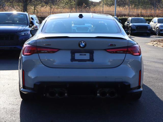 used 2025 BMW M4 car, priced at $89,876