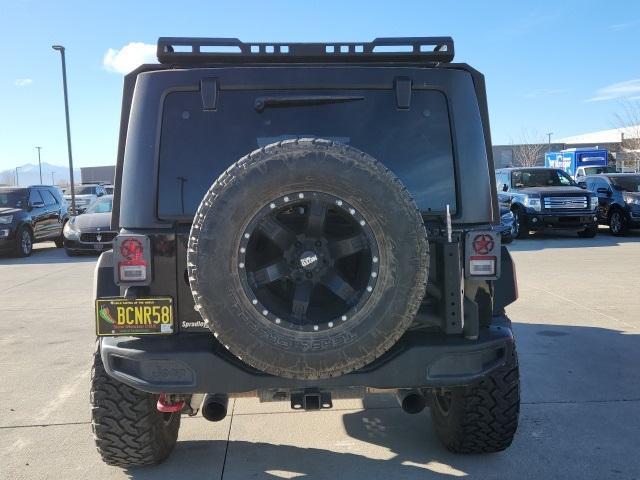 used 2016 Jeep Wrangler Unlimited car, priced at $29,038