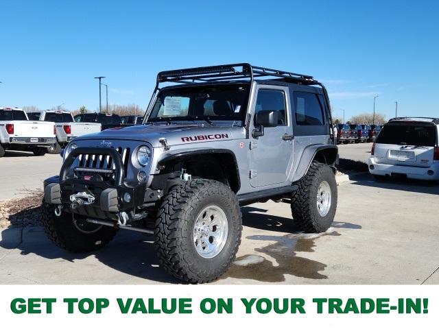 used 2015 Jeep Wrangler car, priced at $28,027