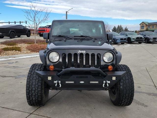 used 2011 Jeep Wrangler Unlimited car, priced at $18,168