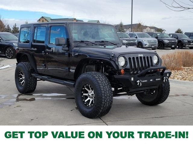 used 2011 Jeep Wrangler Unlimited car, priced at $18,413