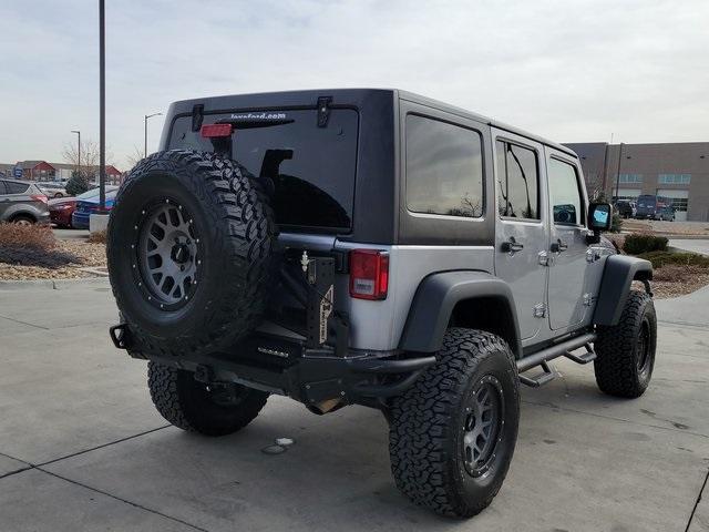 used 2015 Jeep Wrangler Unlimited car, priced at $25,027