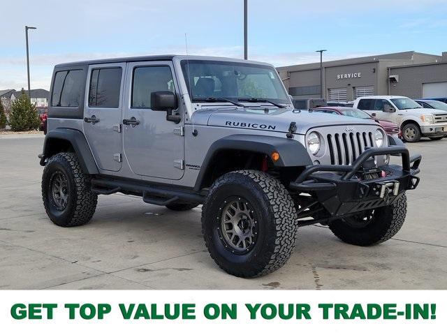 used 2015 Jeep Wrangler Unlimited car, priced at $25,027