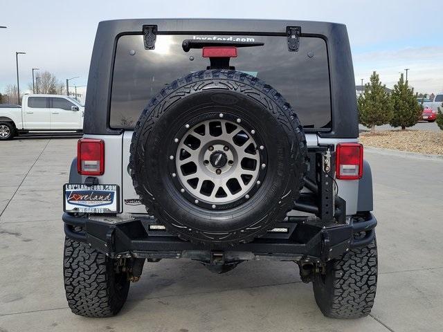 used 2015 Jeep Wrangler Unlimited car, priced at $25,027