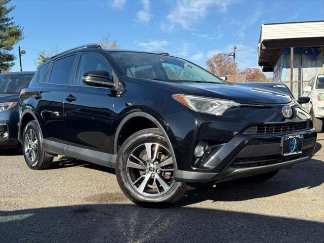 used 2018 Toyota RAV4 car, priced at $13,295