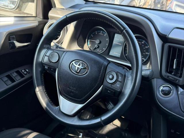 used 2018 Toyota RAV4 car, priced at $17,595