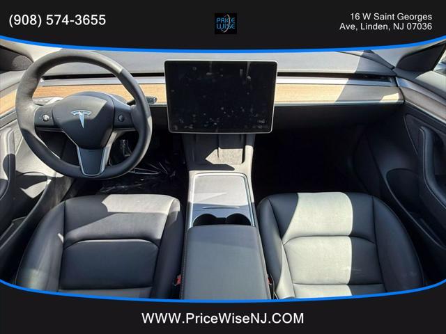 used 2023 Tesla Model 3 car, priced at $22,995