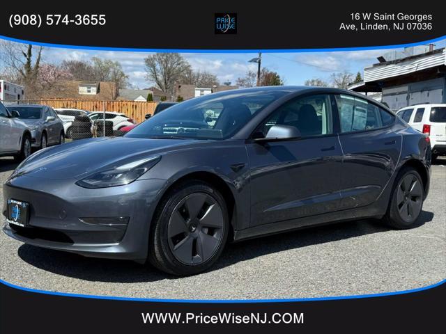 used 2023 Tesla Model 3 car, priced at $22,995