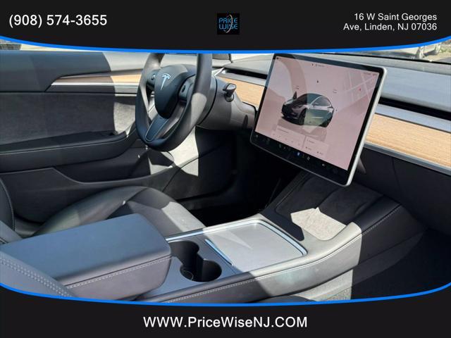 used 2023 Tesla Model 3 car, priced at $22,995
