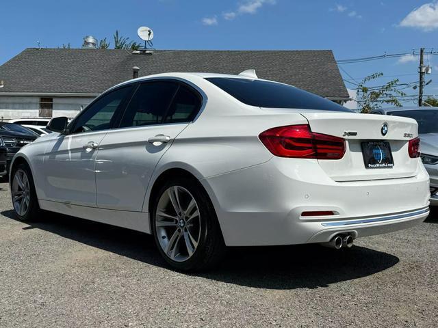 used 2018 BMW 330 car, priced at $17,495