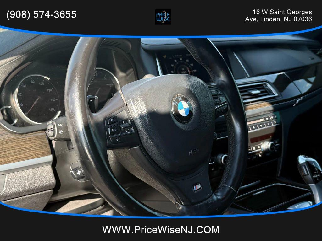 used 2015 BMW 750 car, priced at $13,888