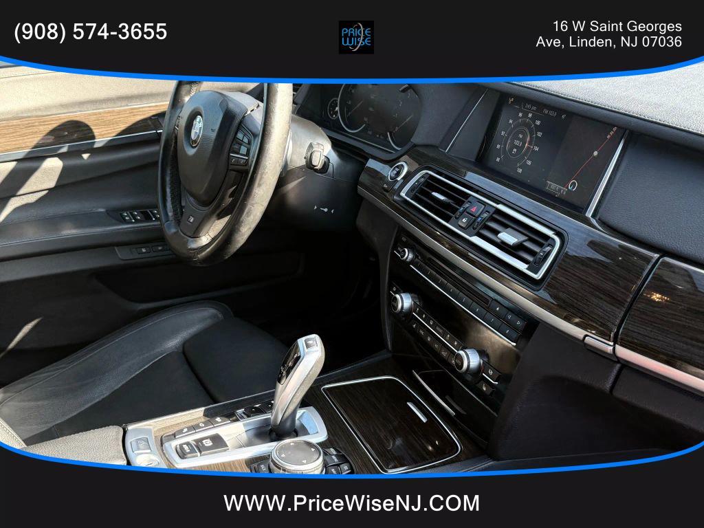 used 2015 BMW 750 car, priced at $13,888