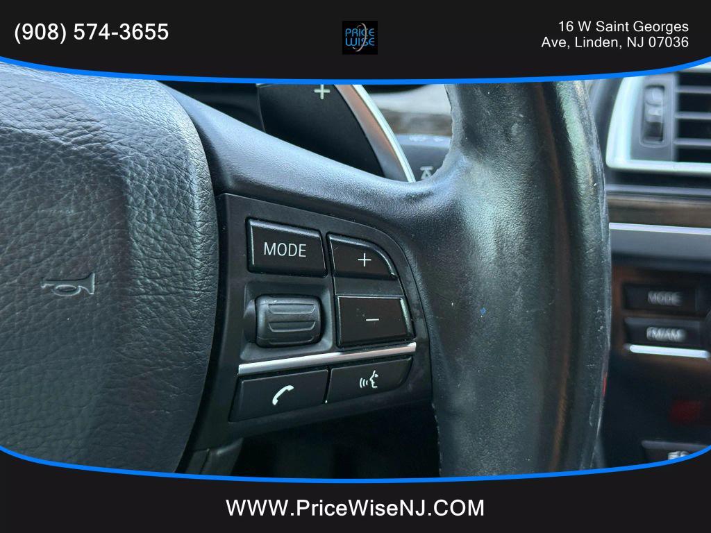 used 2015 BMW 750 car, priced at $13,888