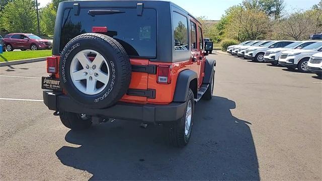 used 2015 Jeep Wrangler Unlimited car, priced at $21,218