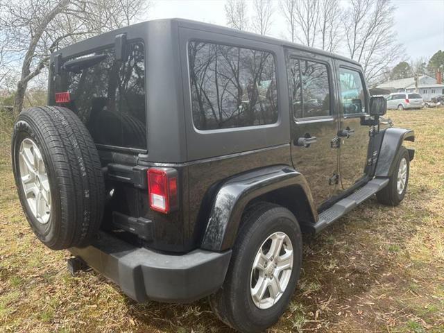 used 2012 Jeep Wrangler Unlimited car, priced at $14,175