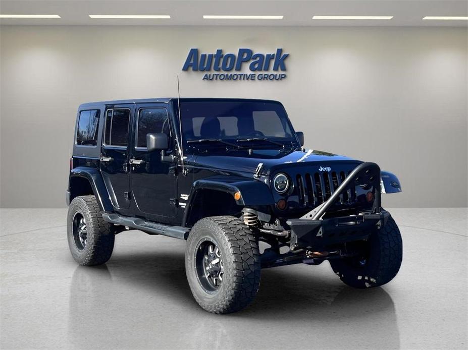 used 2013 Jeep Wrangler Unlimited car, priced at $16,995