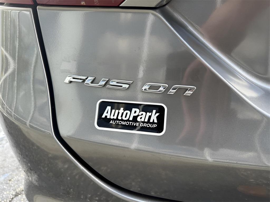 used 2014 Ford Fusion car, priced at $14,995