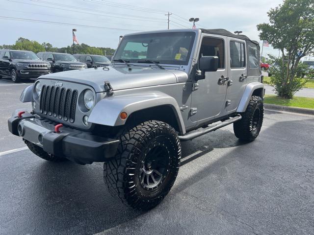 used 2014 Jeep Wrangler Unlimited car, priced at $18,990
