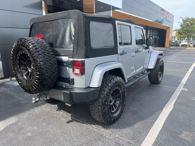 used 2014 Jeep Wrangler Unlimited car, priced at $18,990