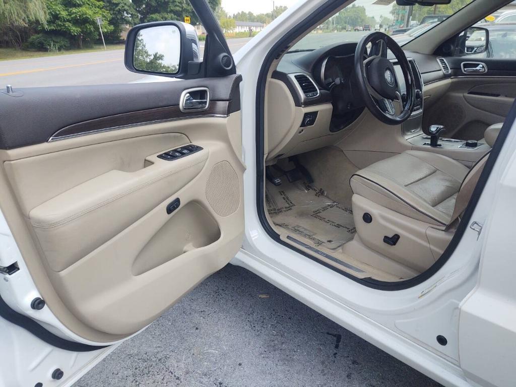 used 2014 Jeep Grand Cherokee car, priced at $14,295